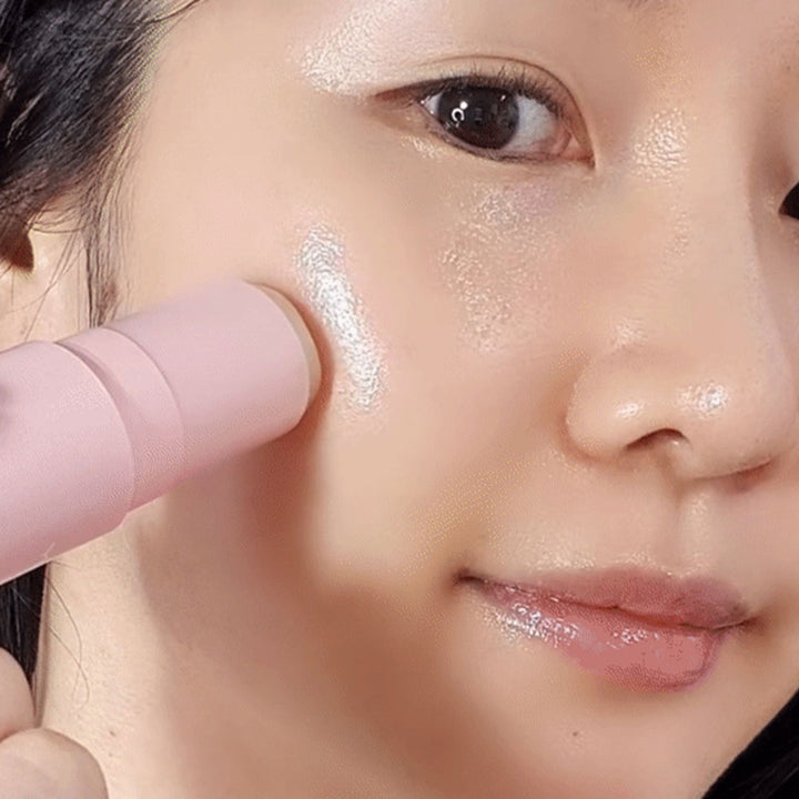 Applying MQNY Collagen Vita Wrinkle Multi Balm on cheek
