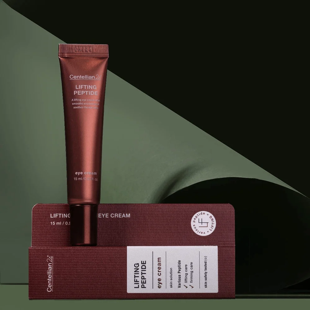 CENTELLIAN24 Lifting Peptide Eye Cream tube standing on its box green backdrop
