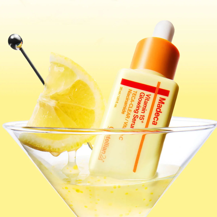 CENTELLIAN24 Madeca Vitamin 15 Glowing Serum bottle in martini glass with lemon